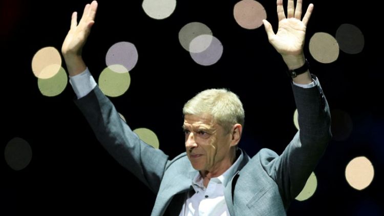 Wenger says he regrets staying at Arsenal for 22 years