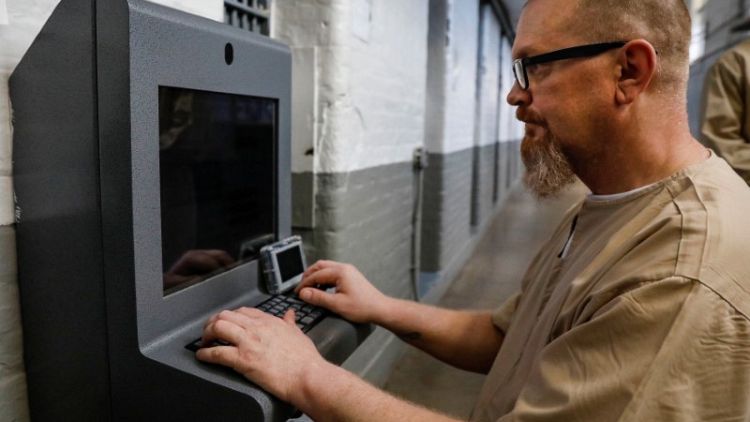 In U.S. prisons, tablets open window to the outside world