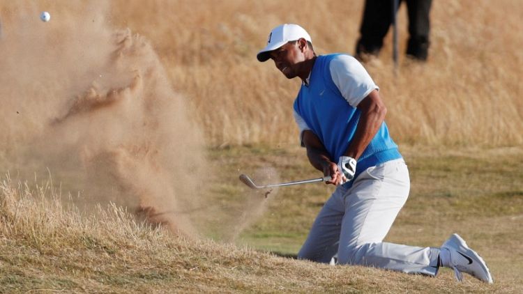 Woods the main attraction as he rolls back the years
