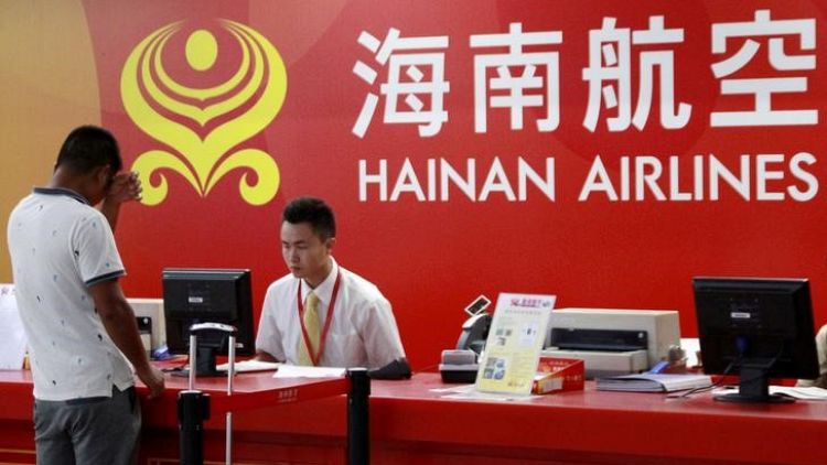China's Hainan Airlines slumps after lifting trading suspension