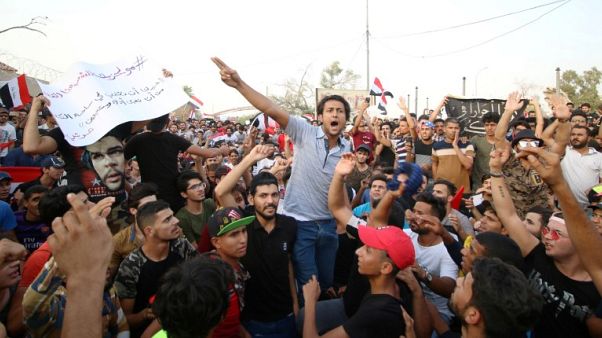 مقتل عراقي في احتجاج عند فرع لمنظمة بدر مقتل عراقي في احتجاج عند فرع لمنظمة بدر