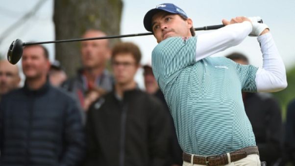 British Open: Kisner et Johnson en tête, Woods dans le par, le N.1 mondial éliminé British Open: Kisner et Johnson en tête, Woods dans le par, le N.1 mondial éliminé