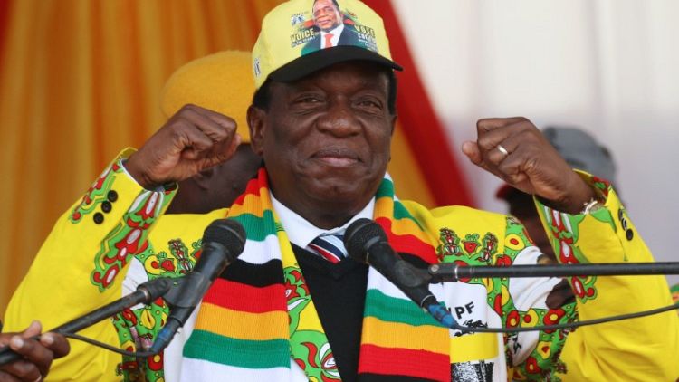 Zimbabwe's president courts white voters ahead of election