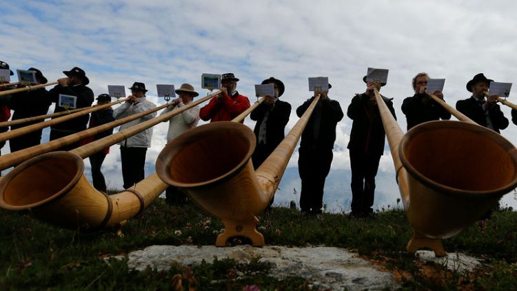 Swiss folklore fans gather for world's biggest alpine horn festival