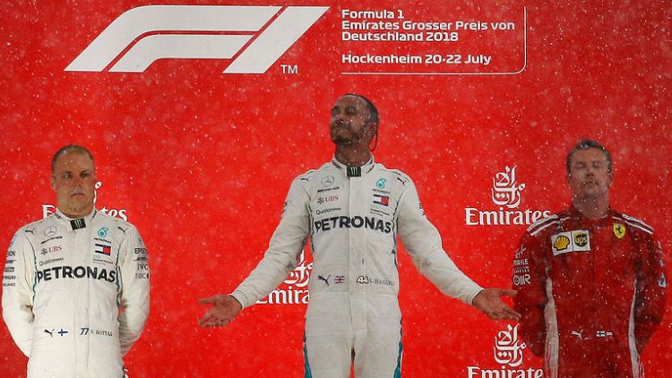 Motor racing - Hamilton retakes F1 lead with 'miracle' victory in Germany