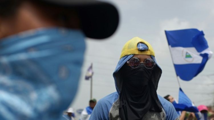 Des opposants au gouvernement manifestent à Managua, le 22 juillet 2018