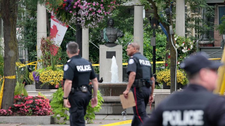 Toronto police seek motive after gunman kills two, injures 13