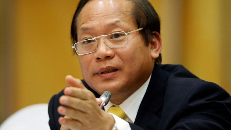 Vietnam suspends information minister amid telecoms scandal-state media
