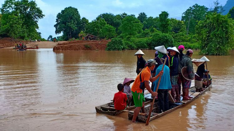 Dozens feared dead, rescuers search for missing after Laos dam collapse