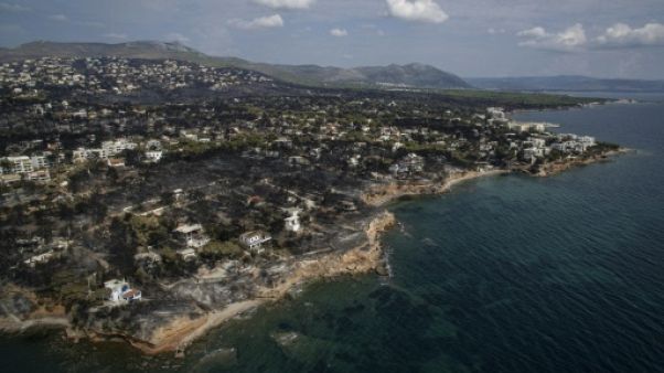 Incendies en Grèce: 82 morts et un difficile processus d'identification Incendies en Grèce: 82 morts et un difficile processus d'identification