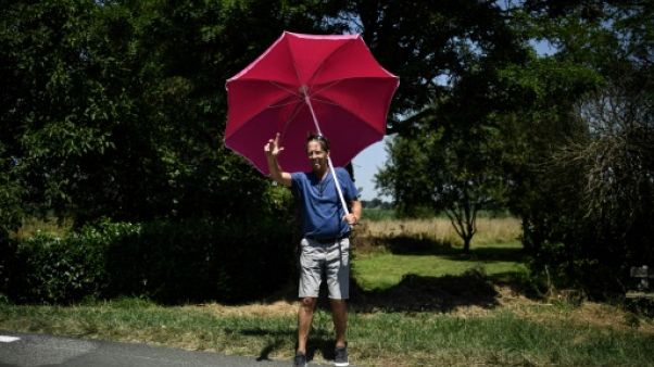 Tour de France: départ de la 18e étape sous la canicule Tour de France: départ de la 18e étape sous la canicule