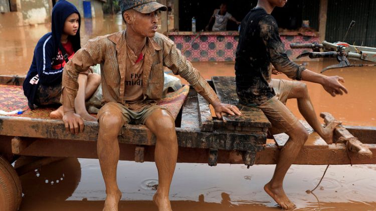 'Not enough time to get out': Laos village caught in burst dam deluge