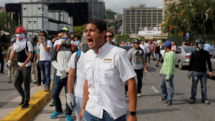 Venezuela lawmaker who denounced health crisis flees, denouncing threats
