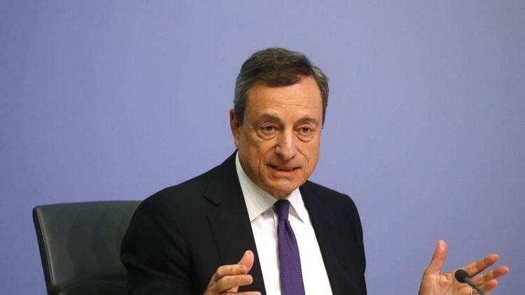 Draghi's pledge on low interest rates hits euro, lifts bonds