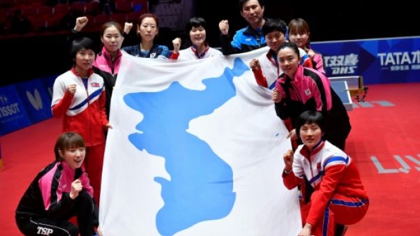 Des Nord-Coréens arrivent au Sud pour s'entraîner avant les Jeux asiatiques Des Nord-Coréens arrivent au Sud pour s'entraîner avant les Jeux asiatiques