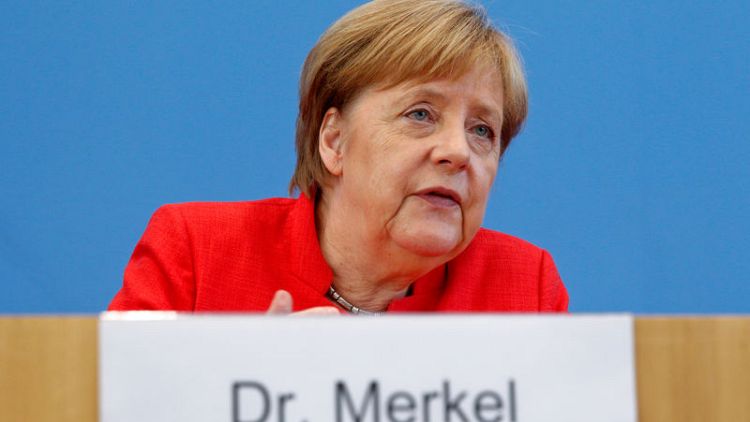 Merkel's conservatives hit 12-year low in German poll