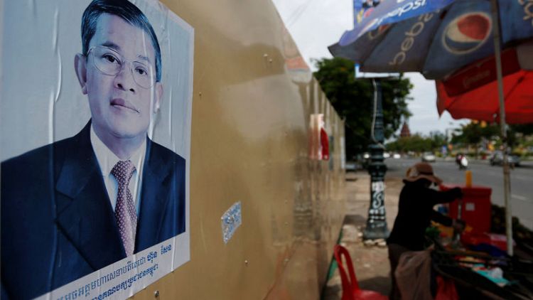 Cambodia dismisses poll criticism, opposition laments 'death of democracy'