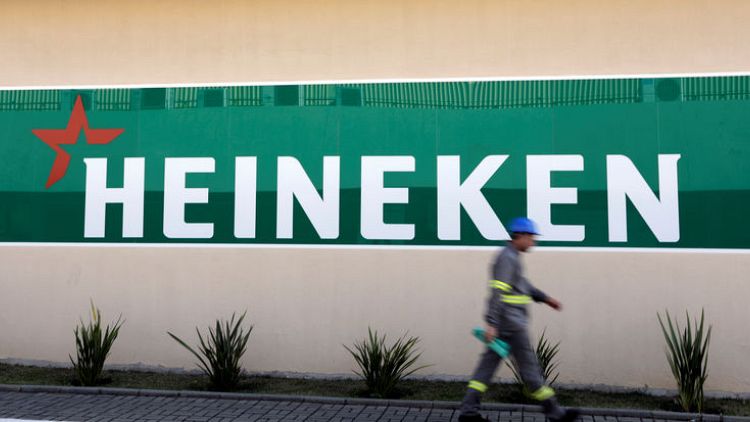Heineken hit as Brazil, currencies force margin outlook cut