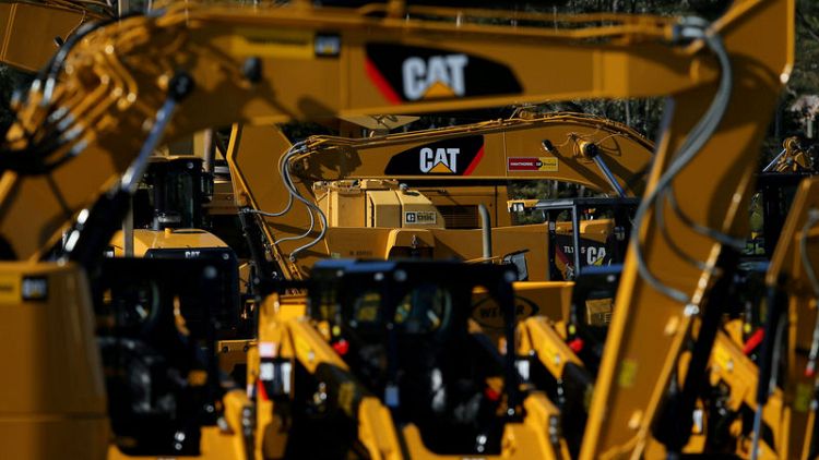 Caterpillar raises 2018 profit outlook after beating quarterly estimates