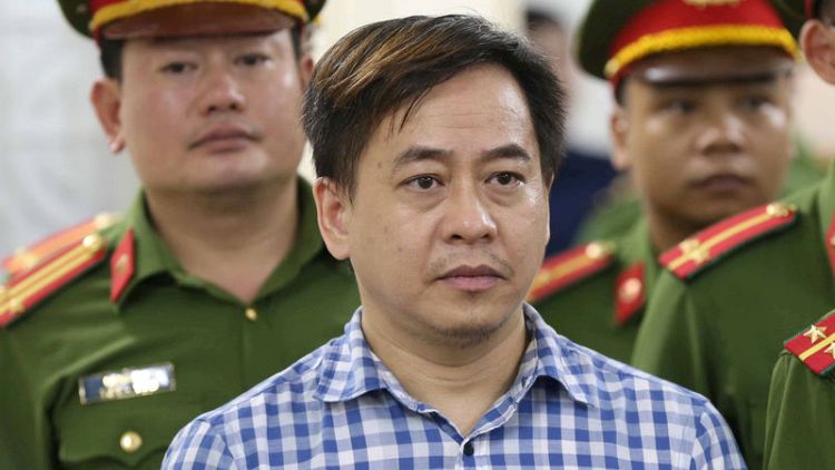 Vietnam jails fugitive tycoon for nine years after one-day trial
