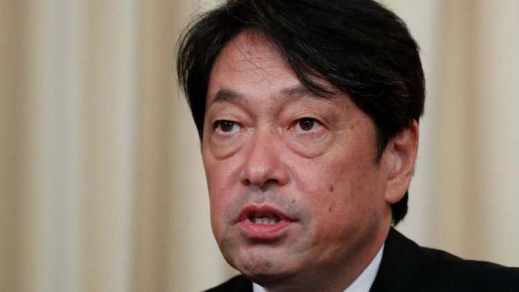 Japan asks Russia to reduce military activity on disputed islands