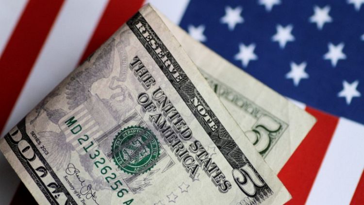 الدولار يصعد لتجدد مخاوف الحرب التجارية وتقييم متفائل للمركزي الأمريكي