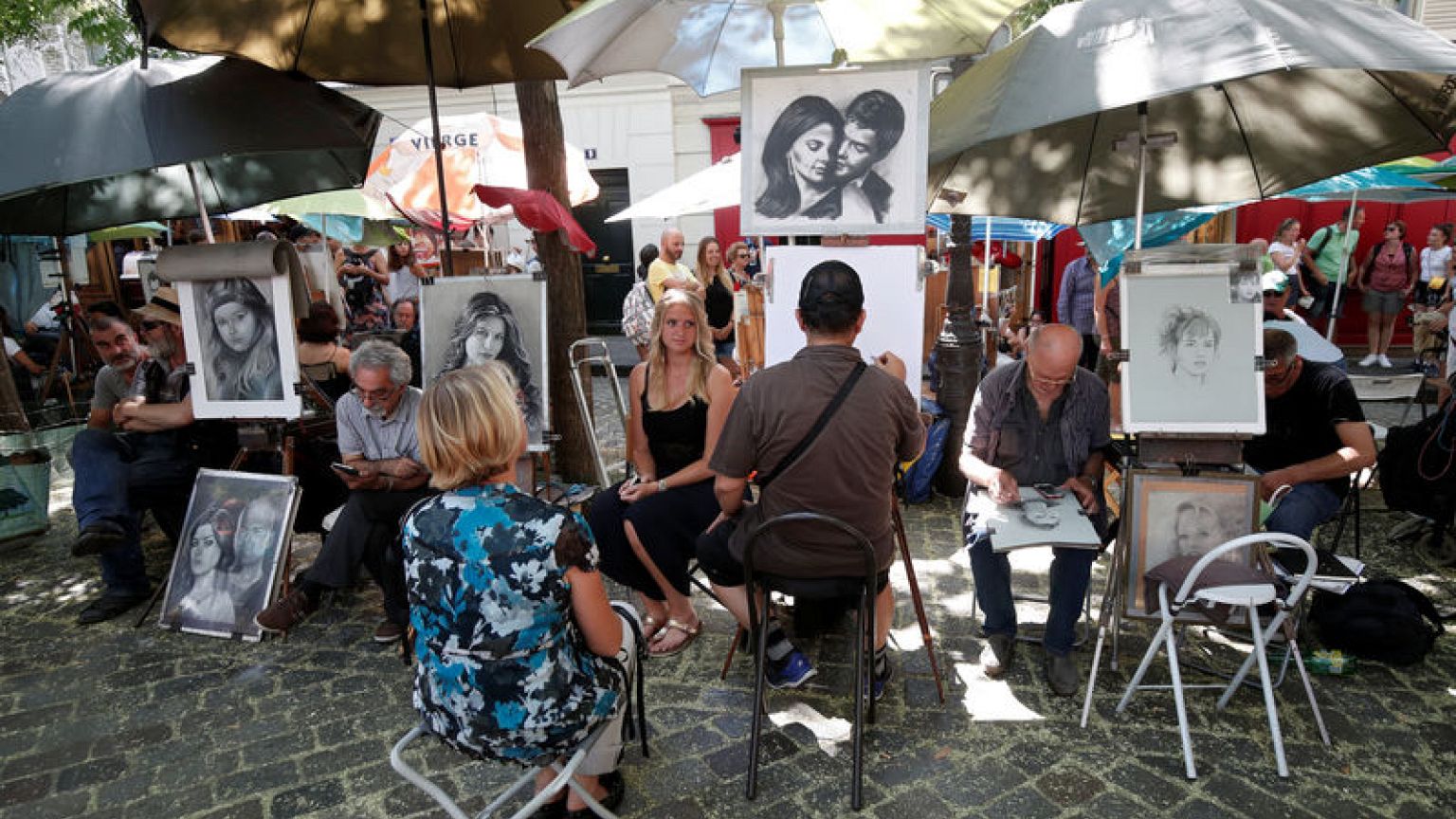 Paris painters threaten to fold up easels over creeping cafes