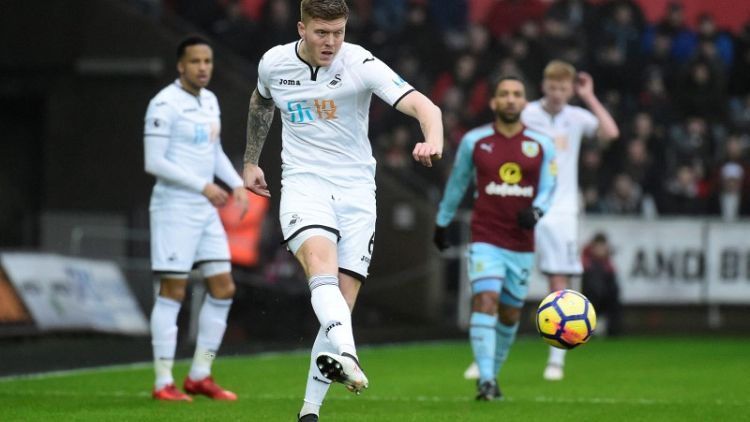 Fulham bring in defender Mawson from Swansea