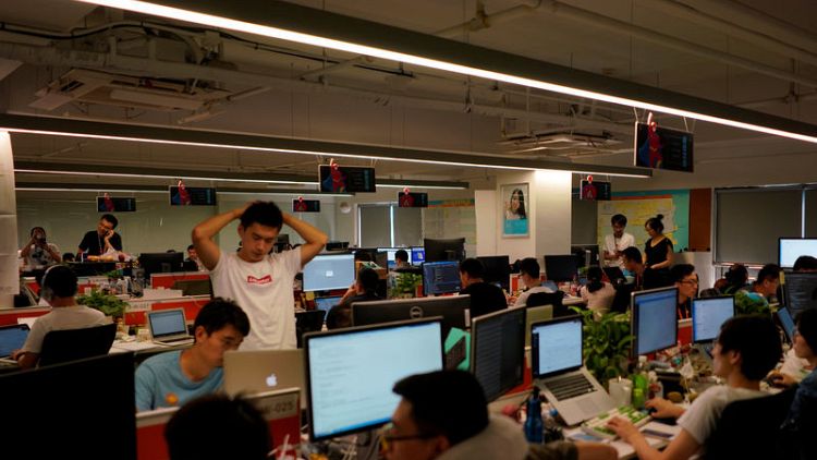 Ding! Always-on Alibaba office app fuels backlash among Chinese workers