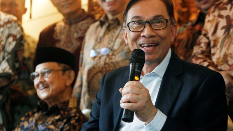 Malaysia's Anwar Ibrahim wins party presidency