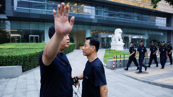 Beijing beefs up security in financial district Beijing beefs up security in financial district