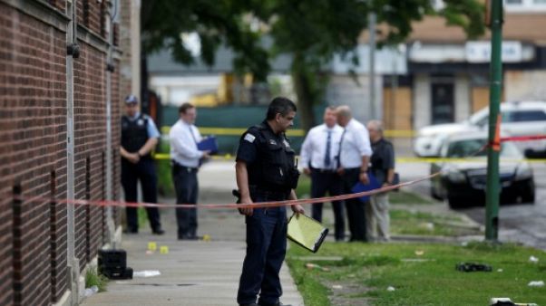 Des policiers sur les lieux d'une fusillade à Chicago, le 5 août 2018 Des policiers sur les lieux d'une fusillade à Chicago, le 5 août 2018
