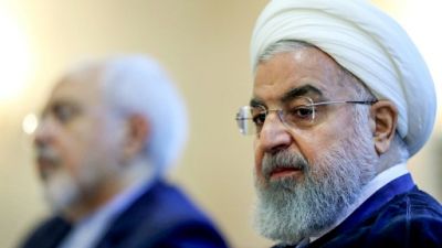 Rohani juge "insensé" des négociations à l'ombre des sanctions américaines Rohani juge "insensé" des négociations à l'ombre des sanctions américaines
