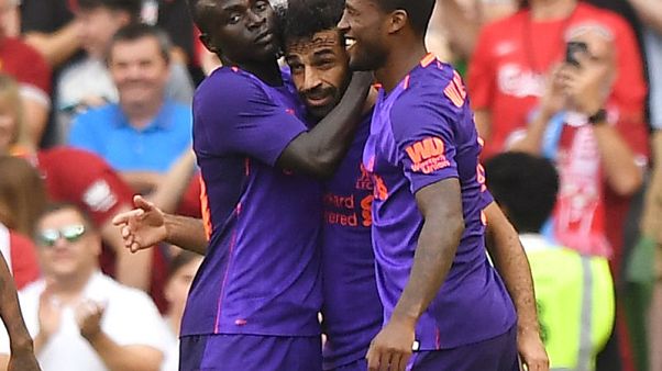 Strengthened Liverpool set to challenge Man City Strengthened Liverpool set to challenge Man City