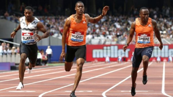 Le Britannique Zharnel Hughes (c) sur 100 m à Londres, le 21 juillet 2018 Le Britannique Zharnel Hughes (c) sur 100 m à Londres, le 21 juillet 2018