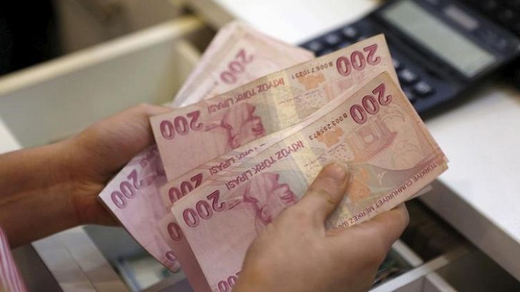 ارتفاع الليرة التركية مقابل الدولار بعد انخفاضها لمستوى قياسي