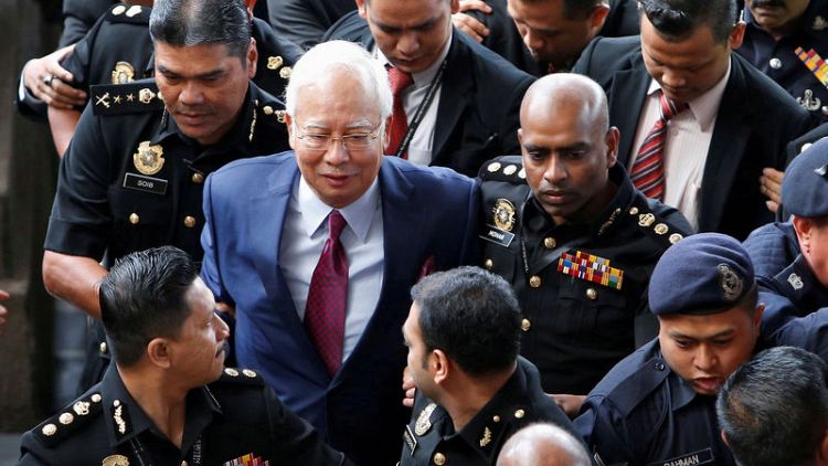 Malaysia's former PM Najib to be charged with money laundering