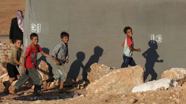 In a Syrian village, Turkish forces seen as shield from attack In a Syrian village, Turkish forces seen as shield from attack