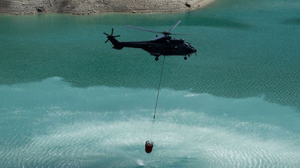 Swiss army airlifts water to thirsty cows in drought-hit pastures Swiss army airlifts water to thirsty cows in drought-hit pastures