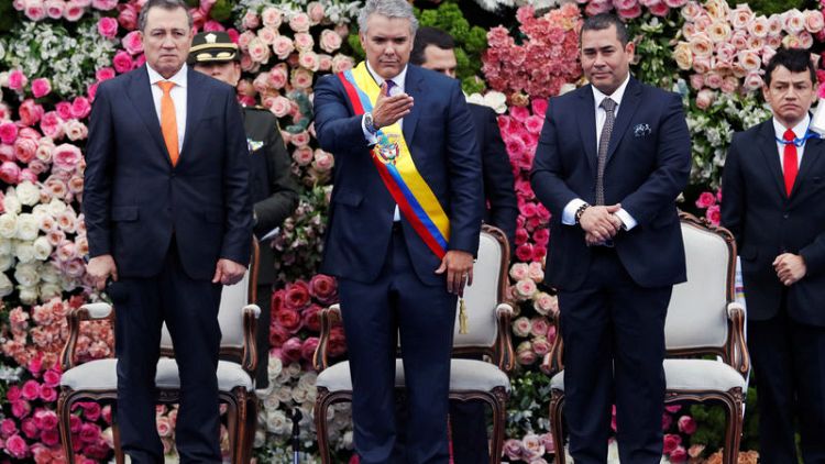 Duque becomes Colombia's president, promising to unite divided nation