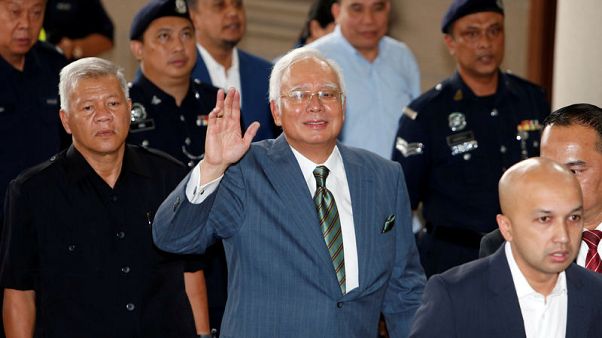 Malaysia's former PM Najib charged with three counts of money laundering Malaysia's former PM Najib charged with three counts of money laundering