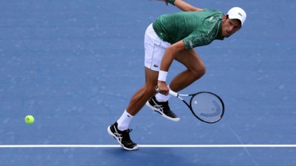 Tennis: Djokovic solide, Wawrinka renversant à Toronto Tennis: Djokovic solide, Wawrinka renversant à Toronto