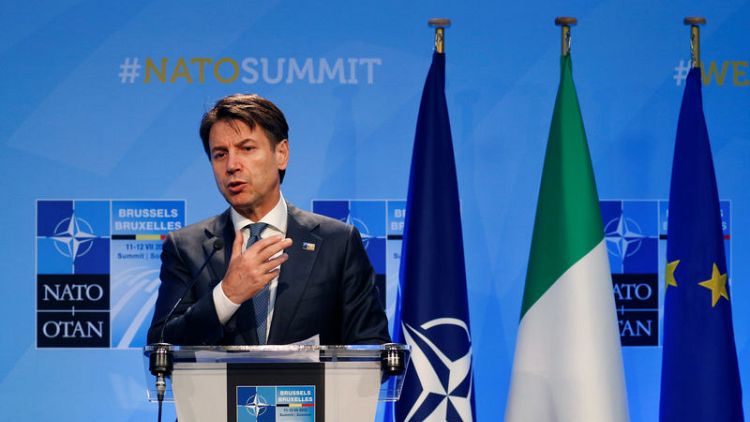 Italy to defend its interests on budget but not make 'foolish' demands - PM says