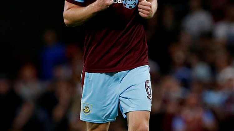 Soccer - Defender Mee signs new three-year deal with Burnley