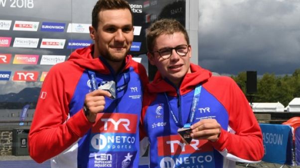 Natation: Reymond en argent et Fontaine en bronze au 5 km en eau libre Natation: Reymond en argent et Fontaine en bronze au 5 km en eau libre