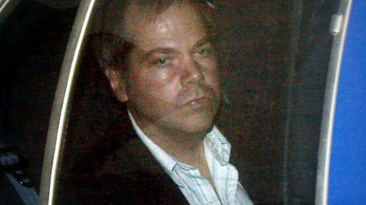 Reagan's would-be assassin seeks unconditional release
