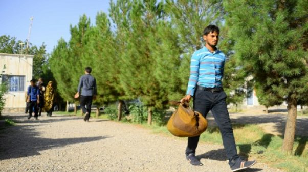 Frappés par la crise économique en Iran, des Afghans rentrent en masse dans leur pays Frappés par la crise économique en Iran, des Afghans rentrent en masse dans leur pays