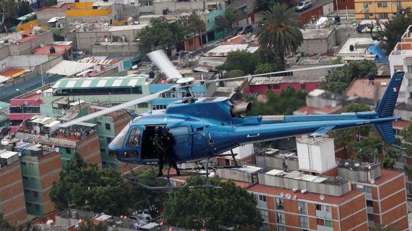 Police choppers thump over Mexico City as drug crime rises Police choppers thump over Mexico City as drug crime rises