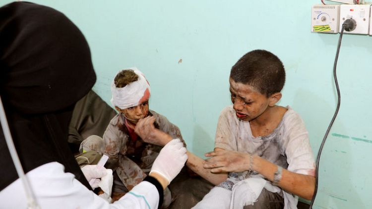Dozens killed, including children on a bus, in Yemen air strikes