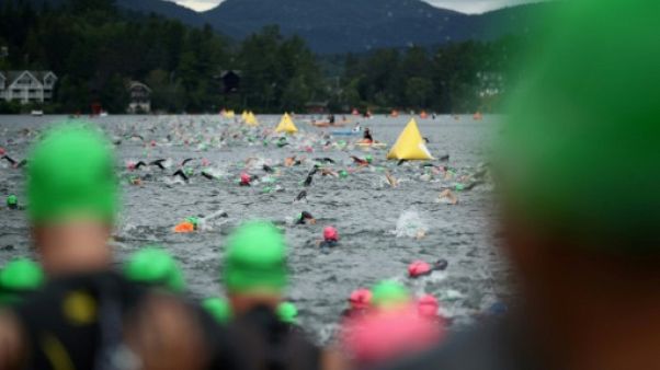 Concurrent(e)s lors d'un Ironman à Lake Placid, le 22 juillet 2018 Concurrent(e)s lors d'un Ironman à Lake Placid, le 22 juillet 2018